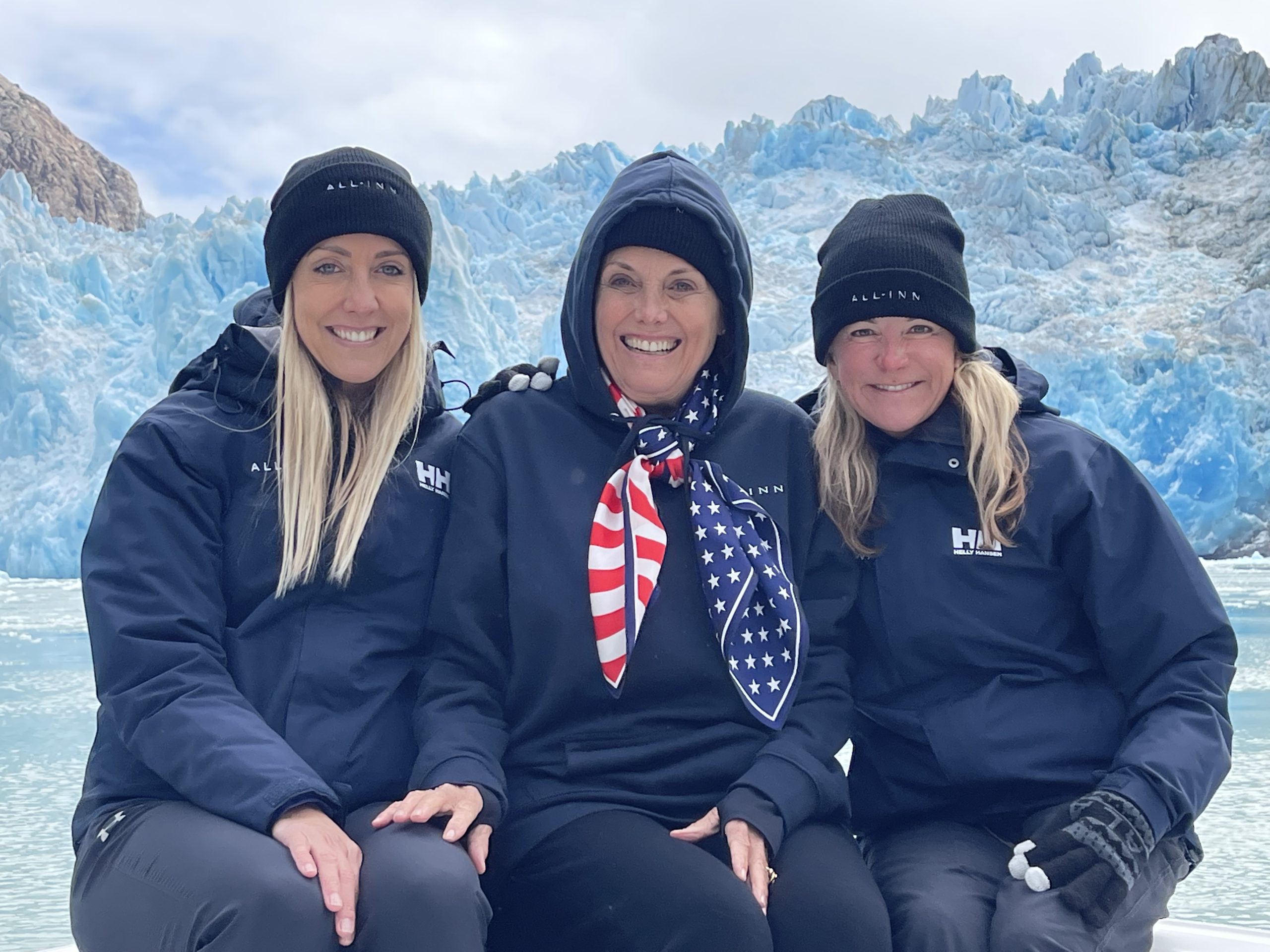 Ann Sutherland of Perennials and David Sutherland Companies pictured in Alaska with Zita Rudd and Allison Paladino of Paladino Rudd Interior Design, aboard their yacht during a scenic coastal excursion.